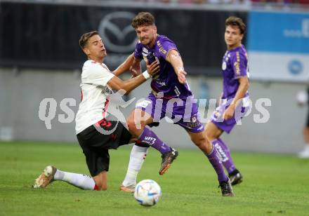 Fussball Testspiel. SK Austria Klagenfurt gegen FC Southampton.   Patrick Hasenhuettl (Klagenfurt),  Jan Bednarek (FC Southampton). Klagenfurt, am 18.7.2022. 
Foto: Kuess

---
pressefotos, pressefotografie, kuess, qs, qspictures, sport, bild, bilder, bilddatenbank