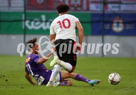 Fussball Testspiel. SK Austria Klagenfurt gegen FC Southampton.   Simon Straudi, (Klagenfurt),  Che Adams (FC Southampton). Klagenfurt, am 18.7.2022. 
Foto: Kuess

---
pressefotos, pressefotografie, kuess, qs, qspictures, sport, bild, bilder, bilddatenbank