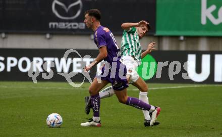 Fussball. Bundesliga. Austria Klagenfurt gegen Rapid Wien. Andrew Irving (Klagenfurt),  Ante Bajic (Rapid).  Klagenfurt, 31.7.2022.
Foto: Kuess
---
pressefotos, pressefotografie, kuess, qs, qspictures, sport, bild, bilder, bilddatenbank