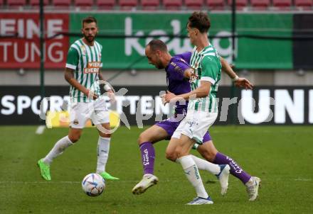 Fussball. Bundesliga. Austria Klagenfurt gegen Rapid Wien. Rico Benatelli (Klagenfurt),   Nikolas Sattlberger (Rapid).  Klagenfurt, 31.7.2022.
Foto: Kuess
---
pressefotos, pressefotografie, kuess, qs, qspictures, sport, bild, bilder, bilddatenbank