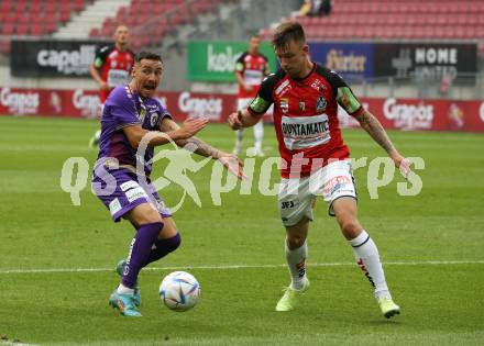 Fussball Bundesliga.  SK Austria Klagenfurt gegen SV Guntamatic Ried.  Sinan Karweina,  (Klagenfurt), Philipp Pomer  (Ried). Klagenfurt, am 13.8.2022. 
Foto: Kuess

---
pressefotos, pressefotografie, kuess, qs, qspictures, sport, bild, bilder, bilddatenbank