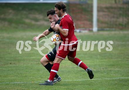 Fussball 2. Klasse C. St. Margarethen im Lavanttal gegen St. Paul.  Raphael Kargl (St.Margarethen),   Daniel Felix Perlinger (St. Paul).  St. Matgarethen, am 6.8.2022.
Foto: Kuess
---
pressefotos, pressefotografie, kuess, qs, qspictures, sport, bild, bilder, bilddatenbank