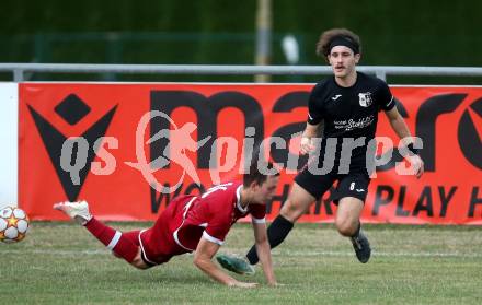 Fussball 2. Klasse C. St. Margarethen im Lavanttal gegen St. Paul. Mathias Tatschl  (St.Margarethen),   Jan Razgorsek (St. Paul).  St. Matgarethen, am 6.8.2022.
Foto: Kuess
---
pressefotos, pressefotografie, kuess, qs, qspictures, sport, bild, bilder, bilddatenbank