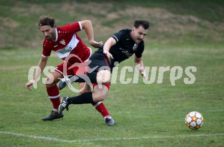 Fussball 2. Klasse C. St. Margarethen im Lavanttal gegen St. Paul.  Raphael Kargl (St.Margarethen),   Daniel Felix Perlinger (St. Paul).  St. Matgarethen, am 6.8.2022.
Foto: Kuess
---
pressefotos, pressefotografie, kuess, qs, qspictures, sport, bild, bilder, bilddatenbank