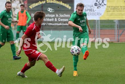 Fussball Kaerntner Liga. Landskron gegen ATSV Wolfsberg.  Markus Ulbing  (Landskron),    Noah Mueller (Wolfsberg).  Landskron,  20.8.2022.
Foto: Kuess
---
pressefotos, pressefotografie, kuess, qs, qspictures, sport, bild, bilder, bilddatenbank