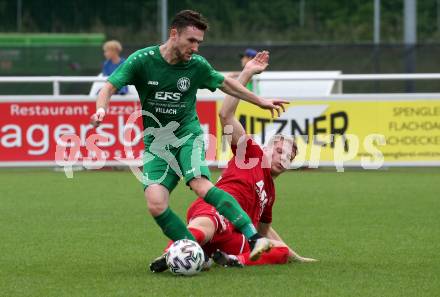 Fussball Kaerntner Liga. Landskron gegen ATSV Wolfsberg.   Julian Brandstaetter  (Landskron),    Gregor Piskur (Wolfsberg).  Landskron,  20.8.2022.
Foto: Kuess
---
pressefotos, pressefotografie, kuess, qs, qspictures, sport, bild, bilder, bilddatenbank