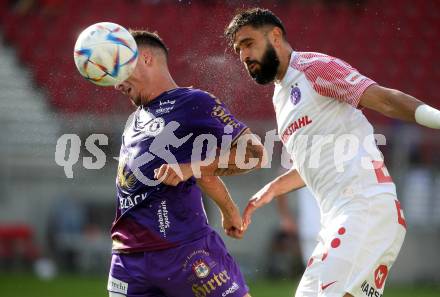 Fussball Bundesliga.  SK Austria Klagenfurt gegen FK Austria Wien.   Sinan Karweina,  (Klagenfurt),   Galvao Da Costa Souza Lucas (Wien). Klagenfurt, am 28.8.2022. 
Foto: Kuess

---
pressefotos, pressefotografie, kuess, qs, qspictures, sport, bild, bilder, bilddatenbank