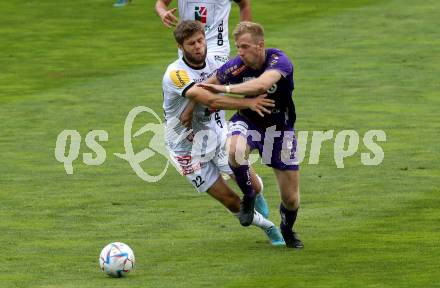 Fussball Bundesliga.  WAC gegen SK Austria Klagenfurt.   Dominik Baumgartner,  (WAC),    Christopher Cvetko (Klagenfurt). Wolfsberg, am 4.9..2022. 
Foto: Kuess

---
pressefotos, pressefotografie, kuess, qs, qspictures, sport, bild, bilder, bilddatenbank