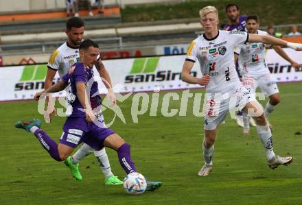 Fussball Bundesliga.  WAC gegen SK Austria Klagenfurt.  Raphael Schiffer,  (WAC),    Sinan Karweina  (Klagenfurt). Wolfsberg, am 4.9..2022. 
Foto: Kuess

---
pressefotos, pressefotografie, kuess, qs, qspictures, sport, bild, bilder, bilddatenbank