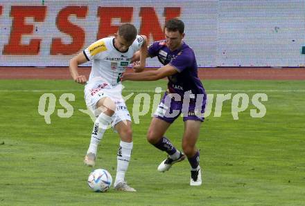 Fussball Bundesliga.  WAC gegen SK Austria Klagenfurt.  Ervin Omic,  (WAC),   Andrew Irving  (Klagenfurt). Wolfsberg, am 4.9..2022. 
Foto: Kuess

---
pressefotos, pressefotografie, kuess, qs, qspictures, sport, bild, bilder, bilddatenbank