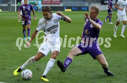 Fussball Bundesliga.  SK Austria Klagenfurt gegen SK Puntigamer Sturm Graz.   Christopher CVetko,  (Klagenfurt),  Stefan Hierlaender  (Graz). Klagenfurt, am 11.9..2022. 
Foto: Kuess

---
pressefotos, pressefotografie, kuess, qs, qspictures, sport, bild, bilder, bilddatenbank