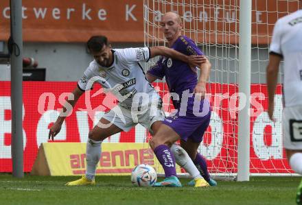 Fussball Bundesliga.  SK Austria Klagenfurt gegen SK Puntigamer Sturm Graz.  Nicolas Wimmer,  (Klagenfurt),  Albian Ajeti  (Graz). Klagenfurt, am 11.9..2022. 
Foto: Kuess

---
pressefotos, pressefotografie, kuess, qs, qspictures, sport, bild, bilder, bilddatenbank