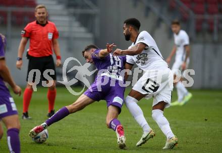 Fussball Bundesliga.  SK Austria Klagenfurt gegen SK Puntigamer Sturm Graz.   Andrew Irving, (Klagenfurt), Gregory Wuetrich   (Graz). Klagenfurt, am 11.9..2022. 
Foto: Kuess

---
pressefotos, pressefotografie, kuess, qs, qspictures, sport, bild, bilder, bilddatenbank