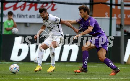 Fussball Bundesliga.  SK Austria Klagenfurt gegen SK Puntigamer Sturm Graz.  Thorsten Mahrer,  (Klagenfurt), Albian Ajeti   (Graz). Klagenfurt, am 11.9..2022. 
Foto: Kuess

---
pressefotos, pressefotografie, kuess, qs, qspictures, sport, bild, bilder, bilddatenbank