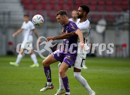 Fussball Bundesliga.  SK Austria Klagenfurt gegen SK Puntigamer Sturm Graz.   Andrew Irving,  (Klagenfurt), Gregory Wuetrich   (Graz). Klagenfurt, am 11.9..2022. 
Foto: Kuess

---
pressefotos, pressefotografie, kuess, qs, qspictures, sport, bild, bilder, bilddatenbank