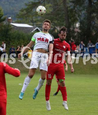 Fussball. Kaerntner Liga. Atus Ferlach gegen SV Feldkirchen.  Petar Maric   (Ferlach),    Martin Hinteregger (Feldkirchen). Ferlach, 24.9.2022.
Foto: Kuess
---
pressefotos, pressefotografie, kuess, qs, qspictures, sport, bild, bilder, bilddatenbank