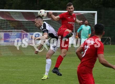 Fussball. Kaerntner Liga. Atus Ferlach gegen SV Feldkirchen.  Martin Posratschnig  (Ferlach),    Bajro Besic (Feldkirchen). Ferlach, 24.9.2022.
Foto: Kuess
---
pressefotos, pressefotografie, kuess, qs, qspictures, sport, bild, bilder, bilddatenbank