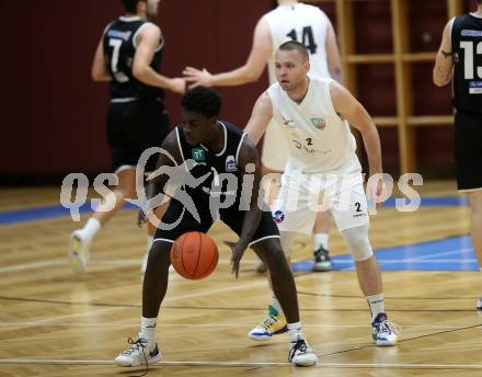 Basketball 2. Liga 2022/2023. Grunddurchgang 1. Runde.  KOS Celovec gegen  RAIDERS Tirol.   Tim Huber (KOS),  Dennis Acheampong (Tirol). Klagenfurt, am 8.10.2022.
Foto: Kuess
www.qspictures.net
---
pressefotos, pressefotografie, kuess, qs, qspictures, sport, bild, bilder, bilddatenbank