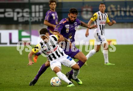 Fussball Bundesliga. SK Austria Klagenfurt gegen LASK   Kosmas Gkezos,  (Klagenfurt),  Sascha Horvath (LASK). Klagenfurt, am 15.10.2022.
Foto: Kuess
---
pressefotos, pressefotografie, kuess, qs, qspictures, sport, bild, bilder, bilddatenbank