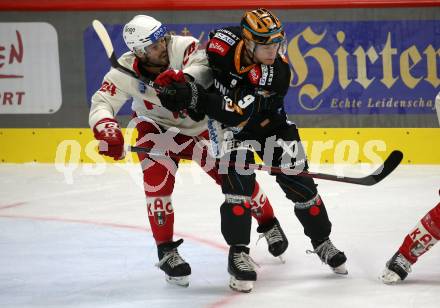 EBEL. Eishockey Bundesliga. EC KAC gegen  Steinbach Black Wings 1992.  Steven Strong,  (KAC),   Emilio Romig (Black Wings). Klagenfurt, am 21.10.2022.
Foto: Kuess
www.qspictures.net
---
pressefotos, pressefotografie, kuess, qs, qspictures, sport, bild, bilder, bilddatenbank