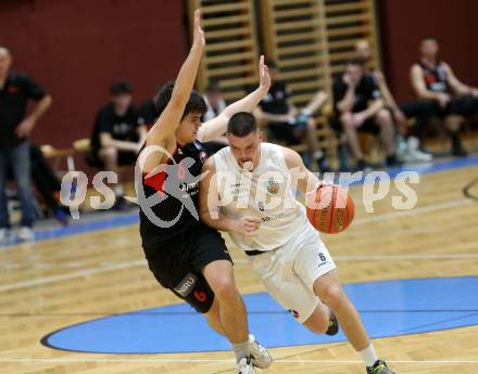 Basketball 2. Liga 2022/2023. Grunddurchgang 4. Runde.  KOS Celovec gegen  Mistelbach Mustangs.  Grega Sajevic  (KOS),  Lukas Schrittwieser (Mistelbach Mustangs). Klagenfurt, am 29.10.2022.
Foto: Kuess
www.qspictures.net
---
pressefotos, pressefotografie, kuess, qs, qspictures, sport, bild, bilder, bilddatenbank