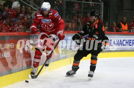 EBEL. Eishockey Bundesliga. EC KAC gegen  Moser Medical Graz99ers.  Bukarts Rihards (KAC),    Altmann Mario (Graz). Klagenfurt, am 15.11.2022.
Foto: Kuess
www.qspictures.net
---
pressefotos, pressefotografie, kuess, qs, qspictures, sport, bild, bilder, bilddatenbank