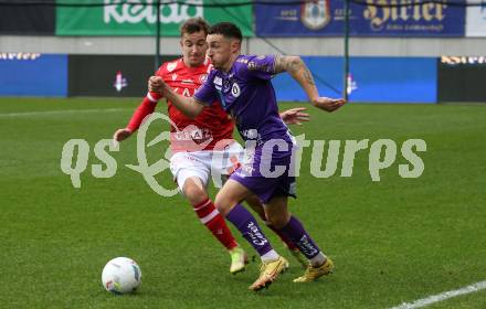 Fussball Woertherseecup. SK Austria Klagenfurt gegen GAK. Sinan Karweina,  (Austria Klagenfurt),  Benjamin Rosenberger (GAK). Klagenfurt, am 19.11.2022.
Foto: Kuess
---
pressefotos, pressefotografie, kuess, qs, qspictures, sport, bild, bilder, bilddatenbank