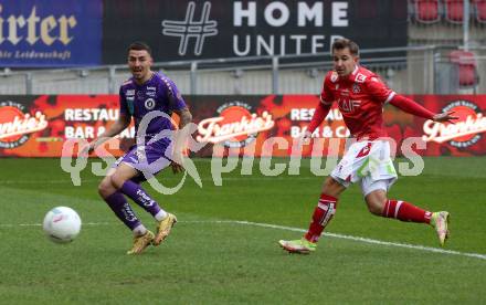 Fussball Woertherseecup. SK Austria Klagenfurt gegen GAK. Sinan Karweina,  (Austria Klagenfurt),  Benjamin Rosenberger (GAK). Klagenfurt, am 19.11.2022.
Foto: Kuess
---
pressefotos, pressefotografie, kuess, qs, qspictures, sport, bild, bilder, bilddatenbank