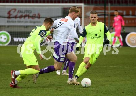 Fussball Woertherseecup. SK Austria Klagenfurt gegen 1860 Muenchen. Jonas Arweiler,  (Austria Klagenfurt),   Niklas Lang  (1860 Muenchen). Klagenfurt, 20.11.2022.
Foto: Kuess
---
pressefotos, pressefotografie, kuess, qs, qspictures, sport, bild, bilder, bilddatenbank