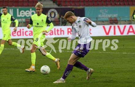 Fussball Woertherseecup. SK Austria Klagenfurt gegen 1860 Muenchen.  Jonas Arweiler, (Austria Klagenfurt),   Fynn Lakenmacher  (1860 Muenchen). Klagenfurt, 20.11.2022.
Foto: Kuess
---
pressefotos, pressefotografie, kuess, qs, qspictures, sport, bild, bilder, bilddatenbank