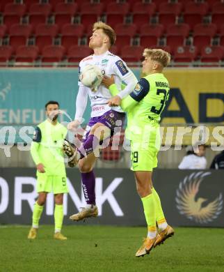 Fussball Woertherseecup. SK Austria Klagenfurt gegen 1860 Muenchen. Jonas Arweiler,   (Austria Klagenfurt),  Leandro Morgalla  (1860 Muenchen). Klagenfurt, 20.11.2022.
Foto: Kuess
---
pressefotos, pressefotografie, kuess, qs, qspictures, sport, bild, bilder, bilddatenbank