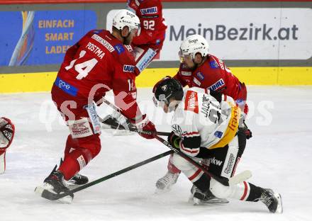 EBEL. Eishockey Bundesliga. EC KAC gegen  Pioneers Vorarlberg.  Paul Ppostma, Rihards Bukarts, (KAC),    Jack Jacome (Vorarlberg). Klagenfurt, am 11.12.2022.
Foto: Kuess
www.qspictures.net
---
pressefotos, pressefotografie, kuess, qs, qspictures, sport, bild, bilder, bilddatenbank