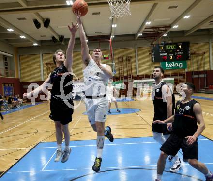 Basketball 2. Liga 2022/2023. Grunddurchgang 11. Runde.  KOS Celovec gegen  Vienna United.   Grega Sajevic (KOS), Marius Witzmann  (Vienna). Klagenfurt, am 17.12.2022.
Foto: Kuess
www.qspictures.net
---
pressefotos, pressefotografie, kuess, qs, qspictures, sport, bild, bilder, bilddatenbank