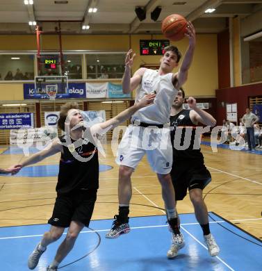 Basketball 2. Liga 2022/2023. Grunddurchgang 11. Runde.  KOS Celovec gegen  Vienna United.   Andrej Blazevic (KOS),  Marius Witzmann (Vienna). Klagenfurt, am 17.12.2022.
Foto: Kuess
www.qspictures.net
---
pressefotos, pressefotografie, kuess, qs, qspictures, sport, bild, bilder, bilddatenbank