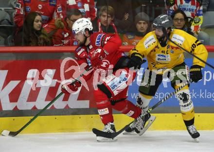 EBEL. Eishockey Bundesliga. EC KAC gegen  HC Pustertal. Rihards Bukarts,   (KAC),    Raphael Andergassen (Pustertal). Klagenfurt, am 18.12.2022.
Foto: Kuess
www.qspictures.net
---
pressefotos, pressefotografie, kuess, qs, qspictures, sport, bild, bilder, bilddatenbank