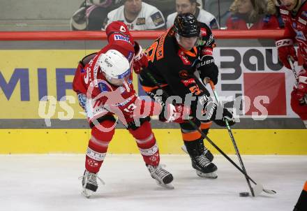 EBEL. Eishockey Bundesliga. EC KAC gegen  Moser Medical Graz99ers.  Rihards Bukarts,  (KAC),  Viktor Granholm  (Graz). Klagenfurt, am 23.12.2022.
Foto: Kuess
www.qspictures.net
---
pressefotos, pressefotografie, kuess, qs, qspictures, sport, bild, bilder, bilddatenbank