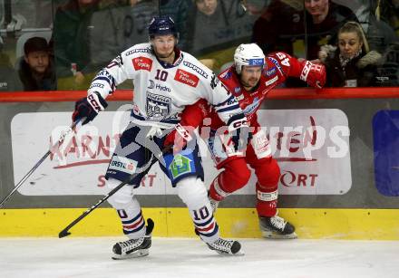 EBEL. Eishockey Bundesliga. EC KAC gegen  Hydro Fehervar AV 19.  Samuel Witting,  (KAC),     Istvan Bartalis (Fehervar). Klagenfurt, am 17.1.2023.
Foto: Kuess
www.qspictures.net
---
pressefotos, pressefotografie, kuess, qs, qspictures, sport, bild, bilder, bilddatenbank