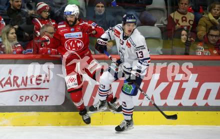 EBEL. Eishockey Bundesliga. EC KAC gegen  Hydro Fehervar AV 19.  Steven Strong,  (KAC),    Kristof Nemeth  (Fehervar). Klagenfurt, am 17.1.2023.
Foto: Kuess
www.qspictures.net
---
pressefotos, pressefotografie, kuess, qs, qspictures, sport, bild, bilder, bilddatenbank