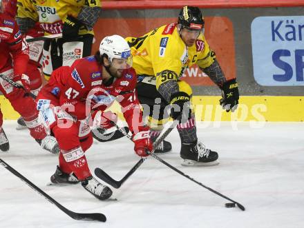 EBEL. Eishockey Bundesliga. EC KAC gegen  spusu Vienna Capitals.  Marcel Witting,    (KAC),    Mario Fischer (Vienna Capitals). Klagenfurt, am 27.1.2023.
Foto: Kuess
www.qspictures.net
---
pressefotos, pressefotografie, kuess, qs, qspictures, sport, bild, bilder, bilddatenbank