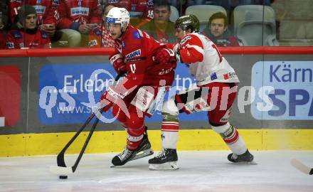 EBEL. Eishockey Bundesliga. EC KAC gegen HCB Suedtirol Alperia   Lukas Haudum,   (KAC),    Enrico Miglioranzi (Bozen). Klagenfurt, am 17.2.2023.
Foto: Kuess
www.qspictures.net
---
pressefotos, pressefotografie, kuess, qs, qspictures, sport, bild, bilder, bilddatenbank