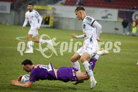 Fussball Bundesliga. SK Austria Klagenfurt gegen RZ Pellets WAC. Andrew Irving,  (Klagenfurt),  Ervin Omic   (WAC). Klagenfurt, am 18.2.2023.
Foto: Kuess
---
pressefotos, pressefotografie, kuess, qs, qspictures, sport, bild, bilder, bilddatenbank