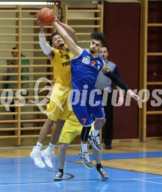 Basketball 2. Liga 2022/2023. Grunddurchgang 17. Runde. Woerthersee Piraten gegen BBU Salzburg.   Marcus Holyfield (Piraten),  Adrian Mitchell (Salzburg). Klagenfurt, am 19.2.2023.
Foto: Kuess
www.qspictures.net
---
pressefotos, pressefotografie, kuess, qs, qspictures, sport, bild, bilder, bilddatenbank