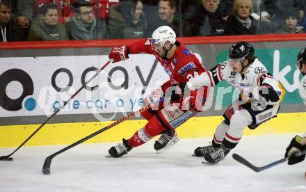 EBEL. Eishockey Bundesliga. EC KAC gegen BEMER Pioneers Vorarlberg.  Steven Strong,    (KAC),   Yannik Lebeda (Vorarlberg). Klagenfurt, am 21.2.2023.
Foto: Kuess
www.qspictures.net
---
pressefotos, pressefotografie, kuess, qs, qspictures, sport, bild, bilder, bilddatenbank