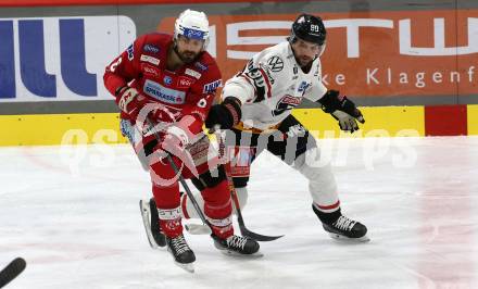 EBEL. Eishockey Bundesliga. EC KAC gegen BEMER Pioneers Vorarlberg.  Lucas Lessio,    (KAC),   Alexander Pallestrang (Vorarlberg). Klagenfurt, am 21.2.2023.
Foto: Kuess
www.qspictures.net
---
pressefotos, pressefotografie, kuess, qs, qspictures, sport, bild, bilder, bilddatenbank