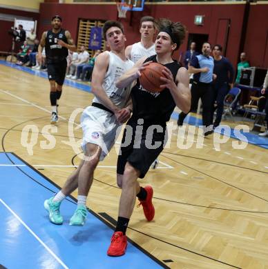 Basketball 2. Liga 2022/2023. Grunddurchgang 18. Runde.  KOS Celovec gegen Woerthersee Piraten. Niklas Michel (KOS), Nick Cevizovic  (Piraten). Klagenfurt, am 25.2.2023.
Foto: Kuess
www.qspictures.net
---
pressefotos, pressefotografie, kuess, qs, qspictures, sport, bild, bilder, bilddatenbank