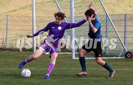 Fussball. Kaerntner Liga. Kraig gegen Austria Klagenfurt Amateure.   Maximilian Felsberger (Kraig),   Josip Pejic (Klagenfurt). Treibach, 25.3.2023
Foto: Kuess


---
pressefotos, pressefotografie, kuess, qs, qspictures, sport, bild, bilder, bilddatenbank