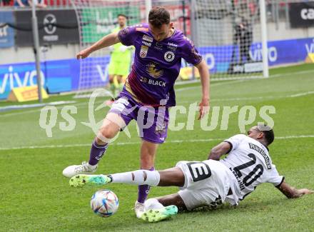 Fussball Bundesliga. SK Austria Klagenfurt gegen Sturm Graz.  Andrew Irving, (Klagenfurt),     Emmanuel Esseh Emegha (Graz).  Klagenfurt, am 16.4.2023.
Foto: Kuess
---
pressefotos, pressefotografie, kuess, qs, qspictures, sport, bild, bilder, bilddatenbank