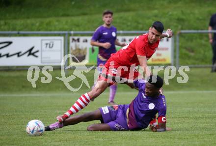 Fussball Kaerntner Liga. SK Austria KLagenfurt Amateure gegen ATSV Wolfsberg.  Mersei Dieu Nsandi  (Austria Klagenfurt),  Andraz Paradiz  (Wolfsberg). Brueckl, am 9.6.2023.
Foto: Kuess



---
pressefotos, pressefotografie, kuess, qs, qspictures, sport, bild, bilder, bilddatenbank