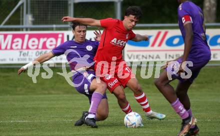 Fussball Kaerntner Liga. SK Austria KLagenfurt Amateure gegen ATSV Wolfsberg.   Bego Kujrakovic (Austria Klagenfurt),   Maximilian Sorger (Wolfsberg). Brueckl, am 9.6.2023.
Foto: Kuess



---
pressefotos, pressefotografie, kuess, qs, qspictures, sport, bild, bilder, bilddatenbank