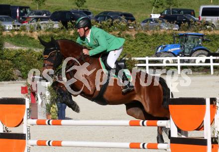 Reiten. Oesterreichische Staatsmeisterschaft. Gerfried Puck auf Equitron Ornaat V. St. Margarethen im Lavanttal. Reiterhof Stueckler, am 24.6.2023.
Foto: Kuess
---
pressefotos, pressefotografie, kuess, qs, qspictures, sport, bild, bilder, bilddatenbank